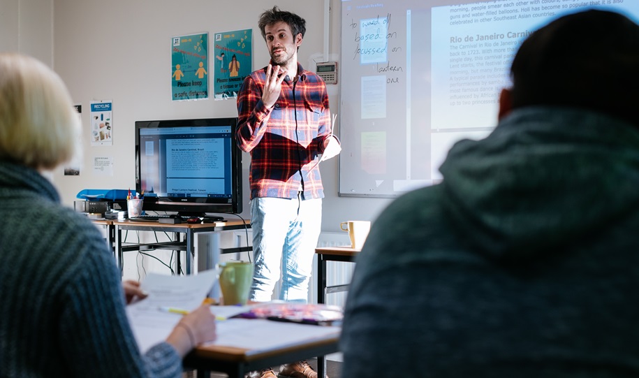 
A group of adult students during an English in -person class