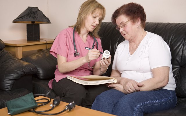A healthcare worker with a patient